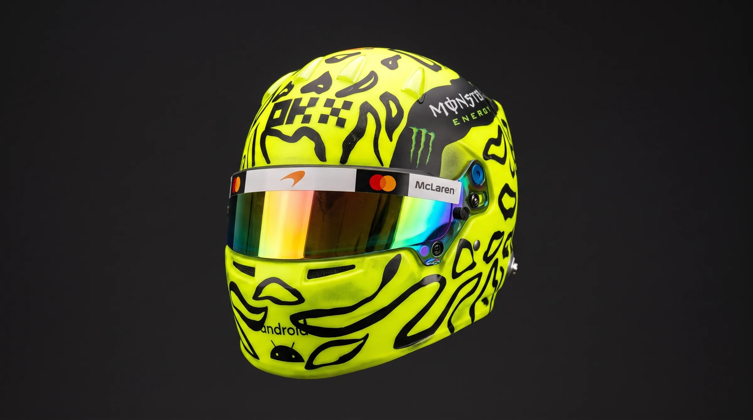 Neon yellow McLaren race helmet with black tiger-stripe livery