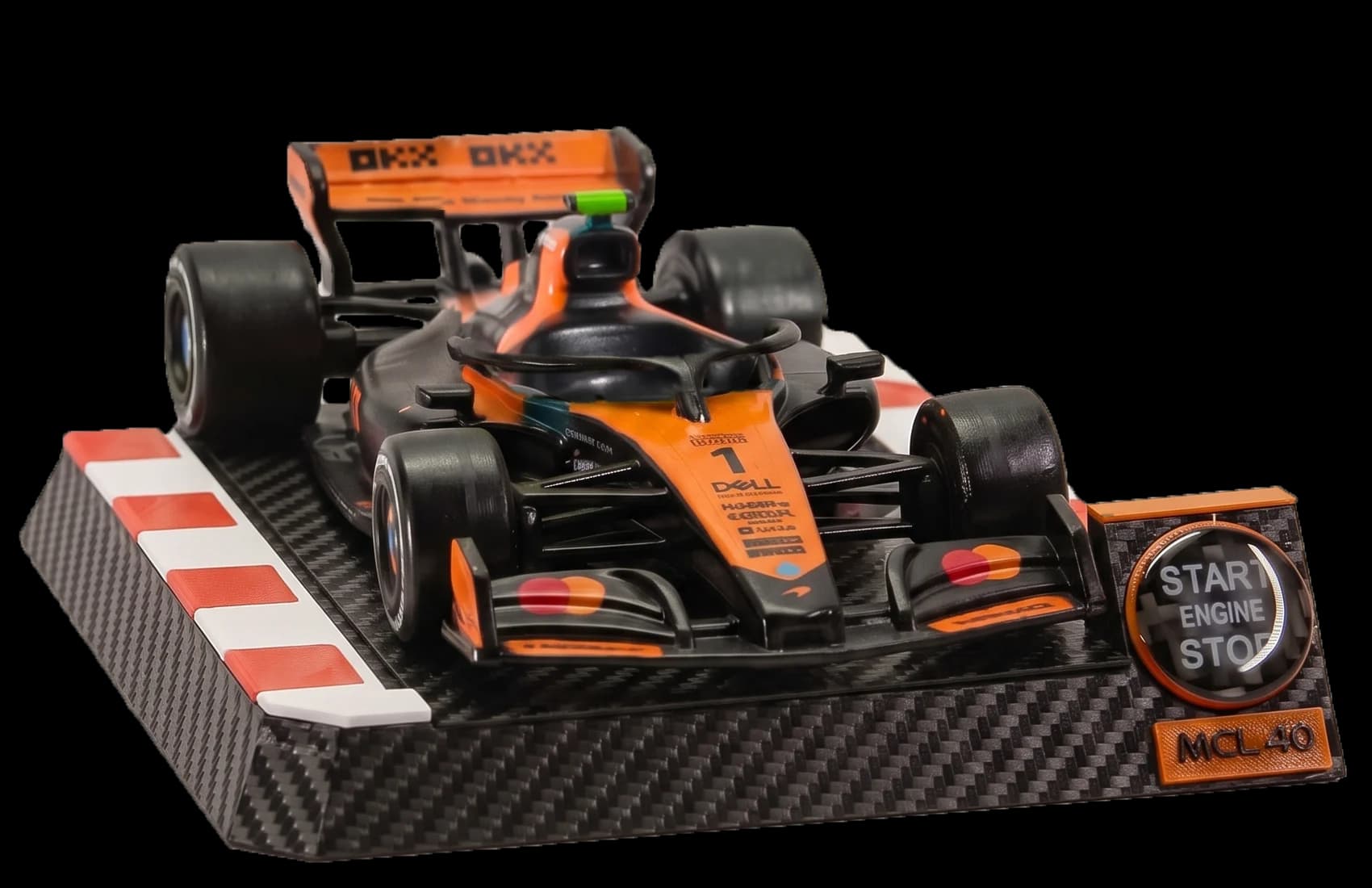 MCL-40 model car on its carbon fiber kerb base